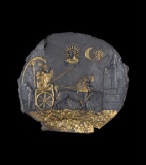 Cat. No. 23: Ceremonial plaque depicting Cybèle (Aï Khanum, Temple with niches) beginning of the 3rd century BC, gilded silver, diameter: 25 cm (9 13/16)  - National Museum of Afghanistan © Thierry Ollivier / Musée Guimet